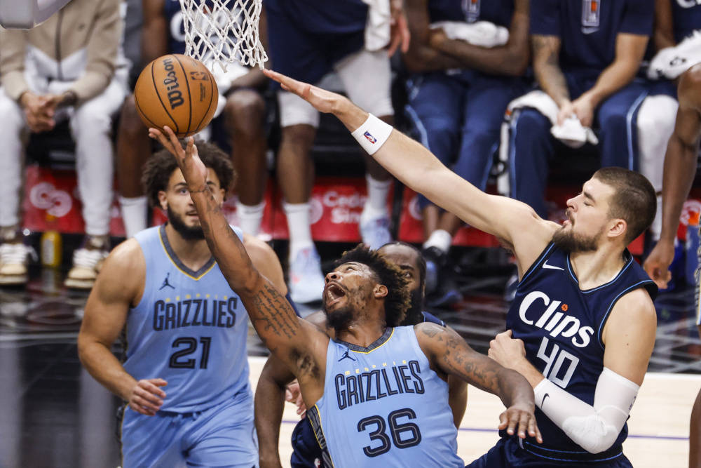 开云体育世界杯-灰熊险胜魔术，伦纳德点燃赛场